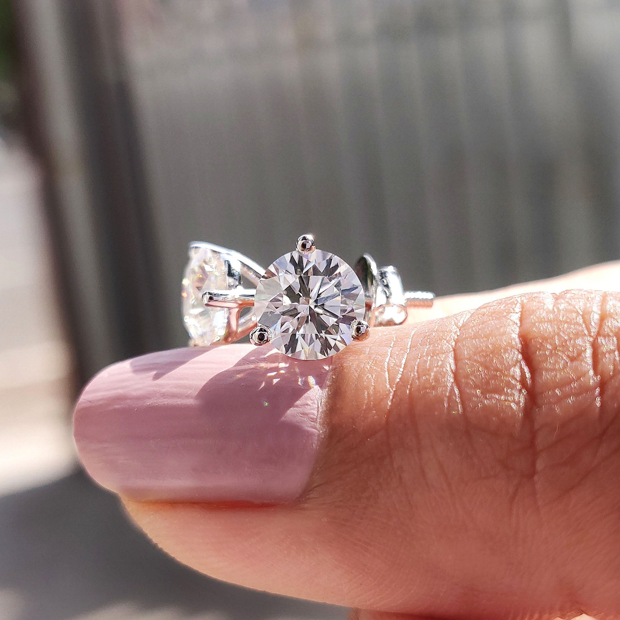 Round Cut Moissanite Earrings In Stud Style