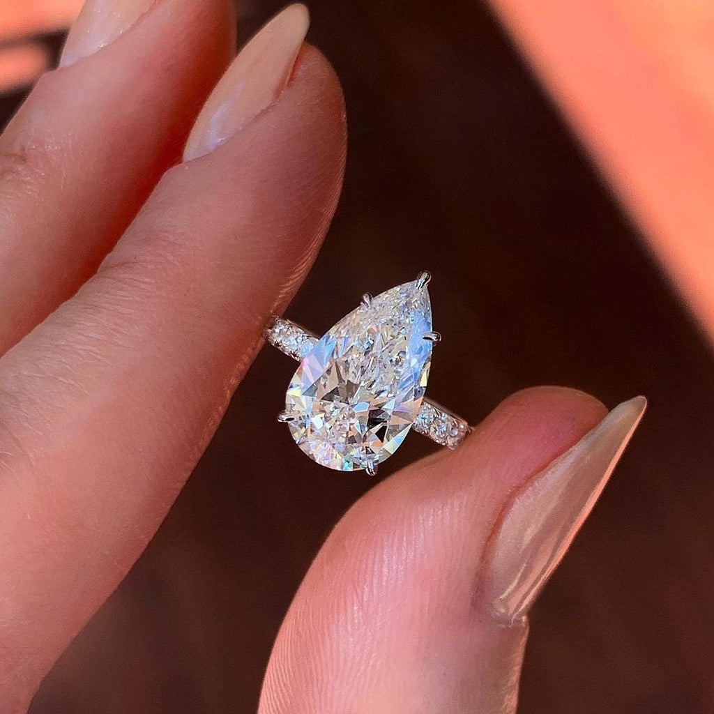 0.94 CT Pear Cut Moissanite Pave Style Engagement Ring