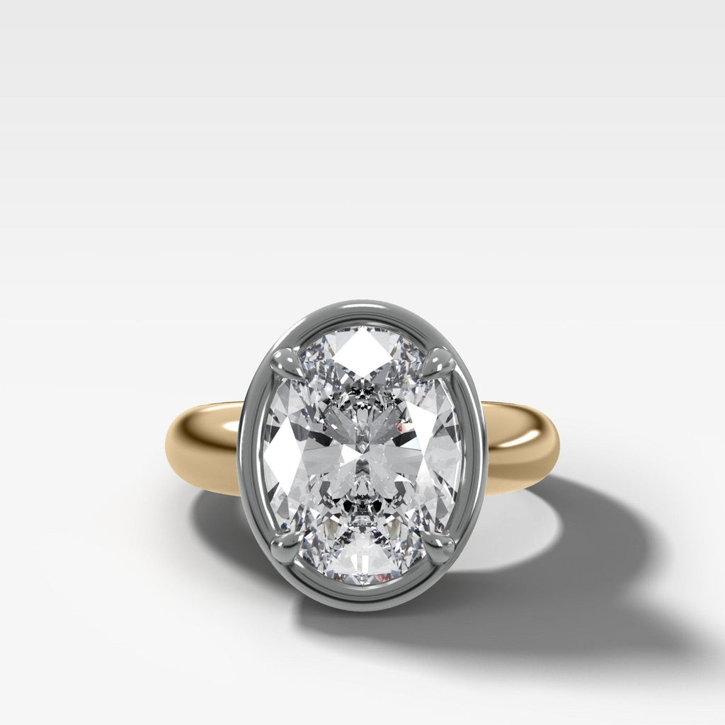 Mixed Metal Club Ring Solitaire Engagement Ring With an Oval Cut Diamond