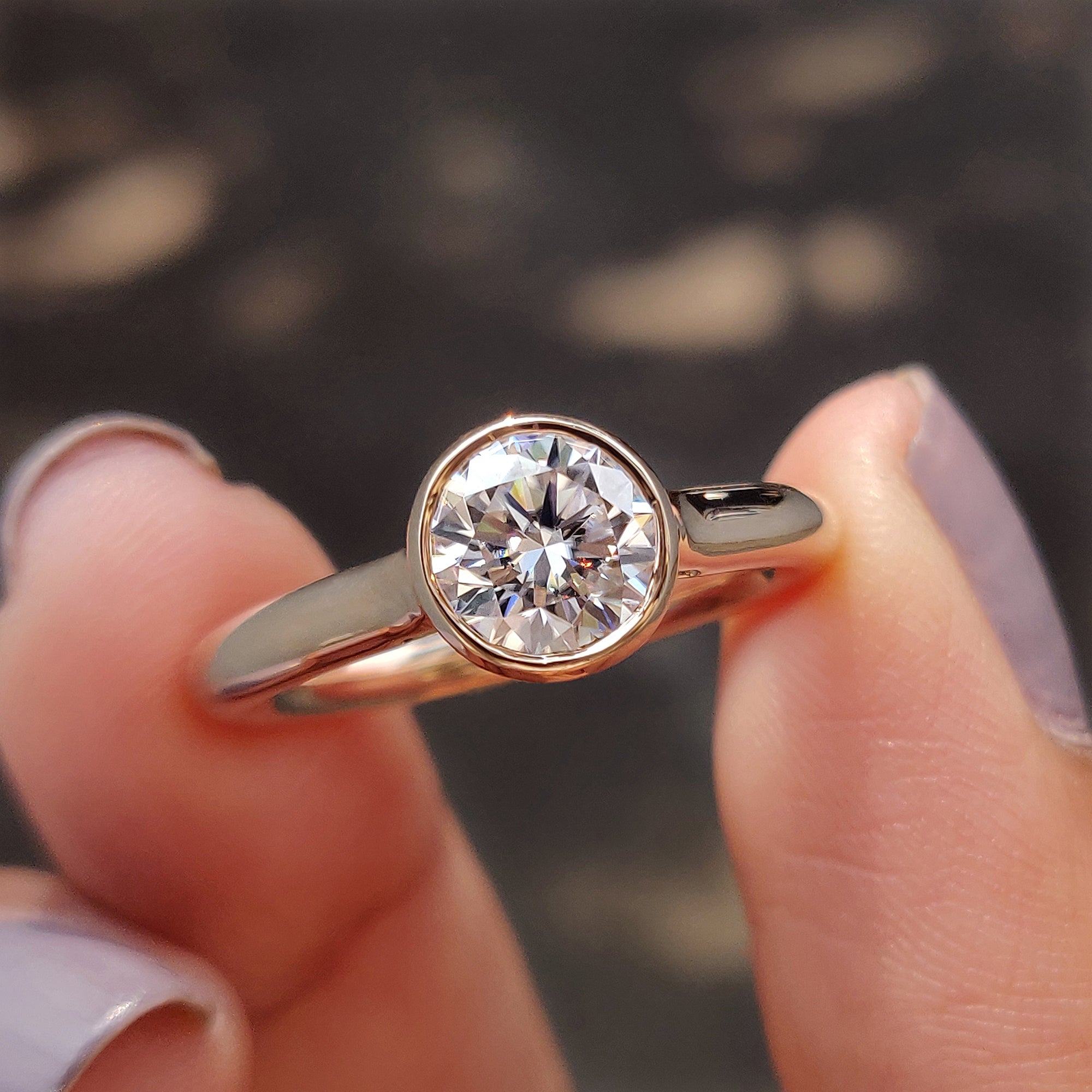 Round Bezel Engagement Ring In Solitaire Style Main image