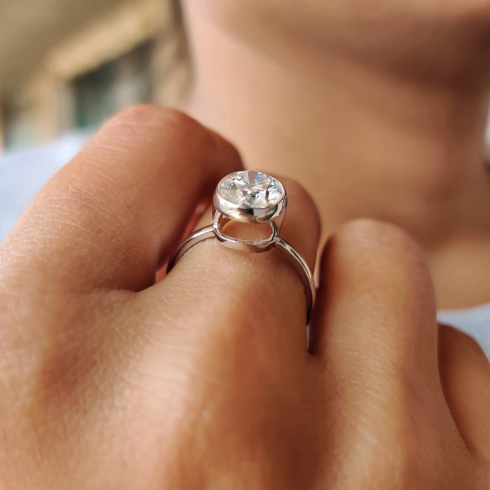 Oval Bezel Engagement Ring In Solitaire Style