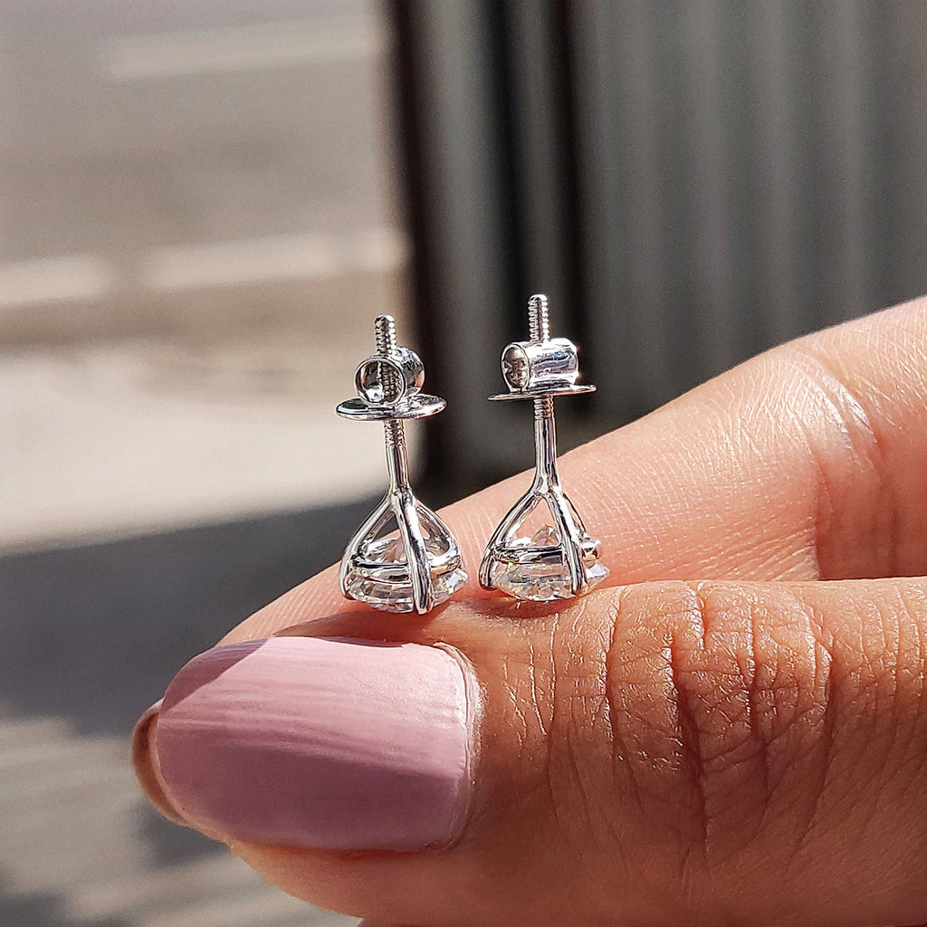 Round Cut Moissanite Earrings In Stud Style