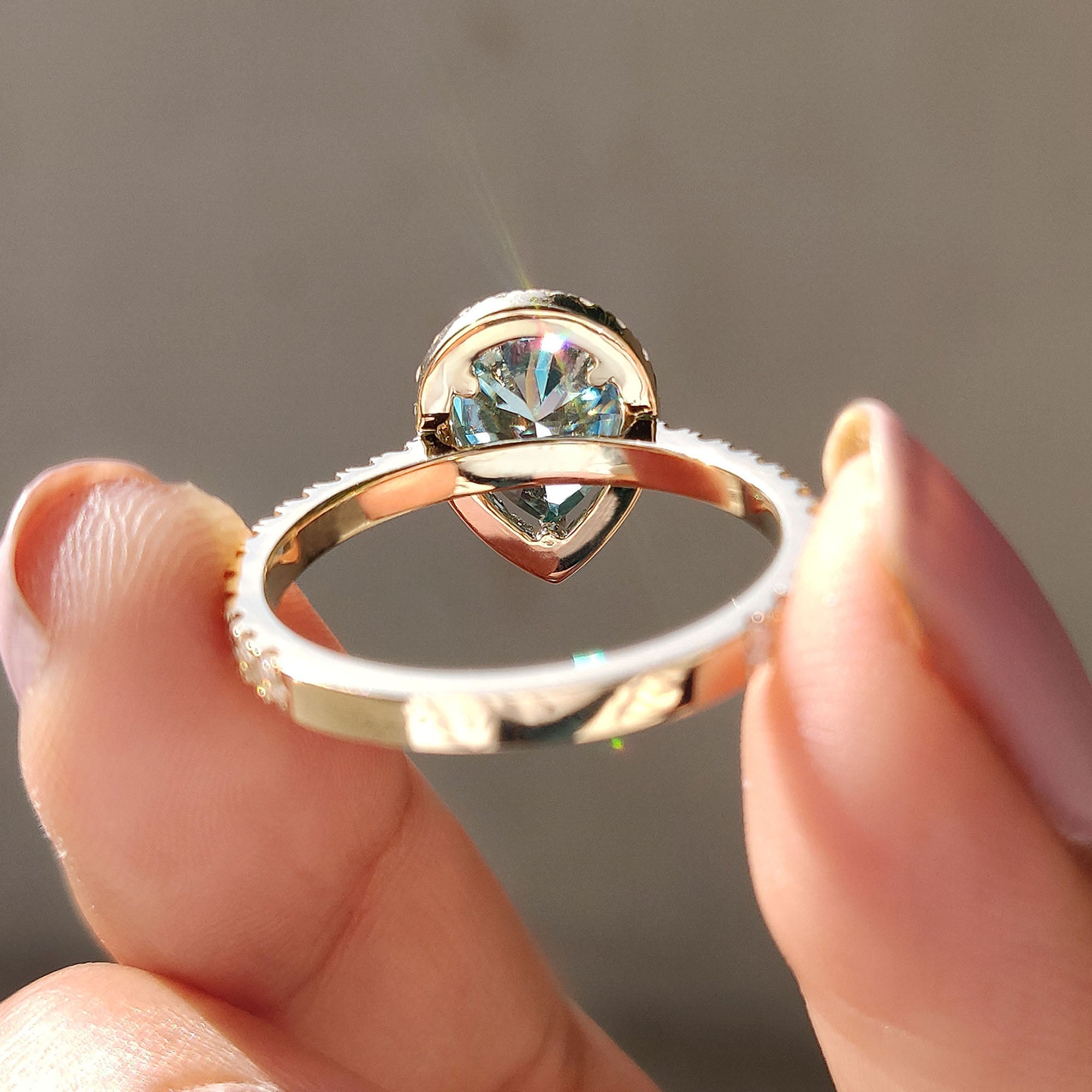 Cyan Blue Pear Cut Engagement Ring In Halo Style
