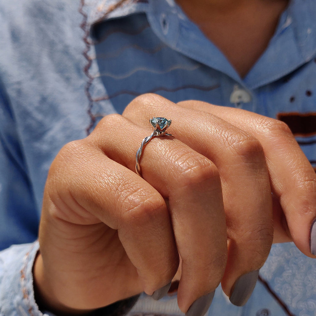 Round Solitaire Engagement Ring With Twisted Setting