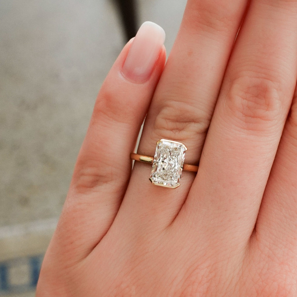 North South Half Bezel Solitaire Engagement Ring with 3.09ct Lab Grown Elongated Radiant Cut Diamond