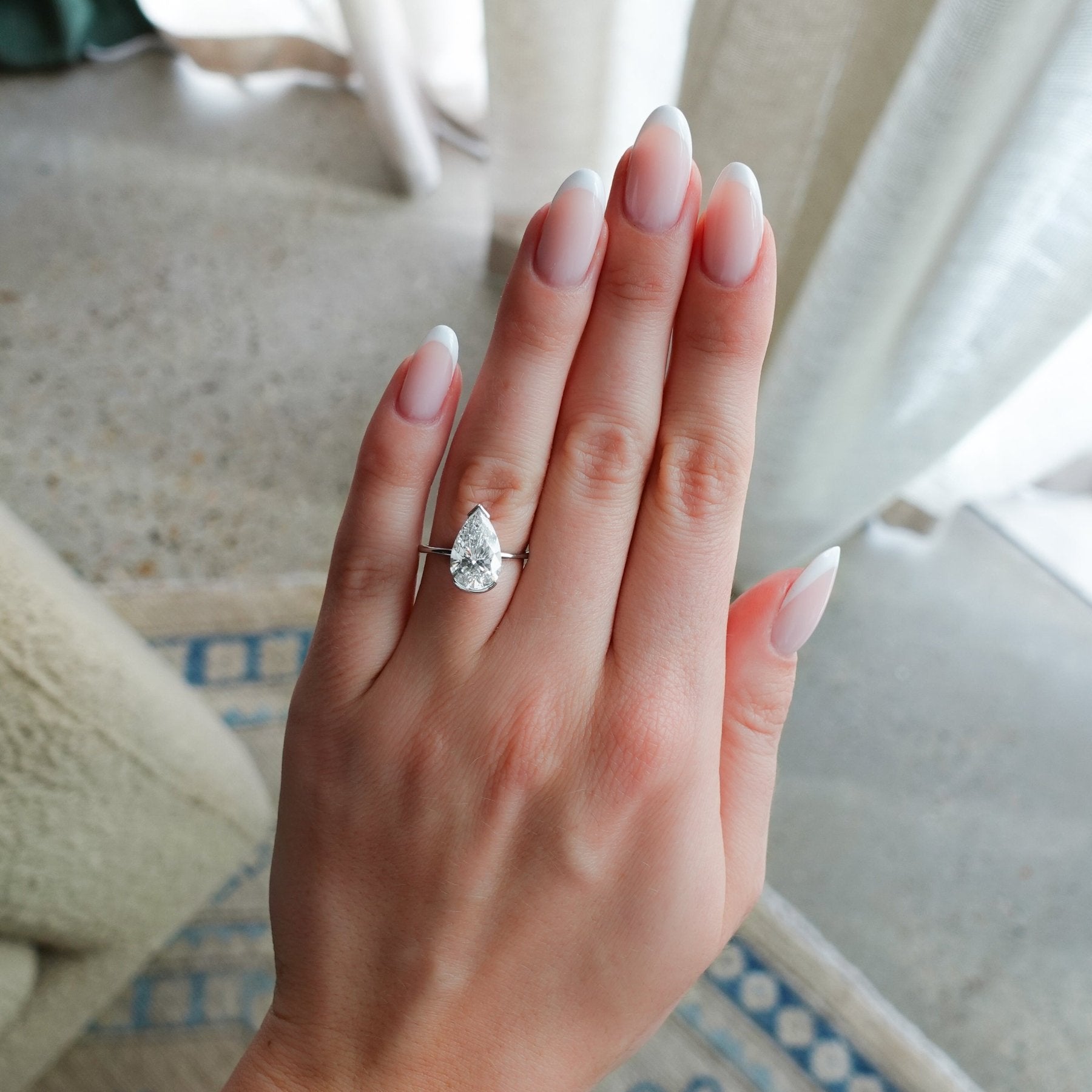 North South Half Bezel Solitaire Engagement Ring With Lab Grown 3.27ct Pear Cut Diamond