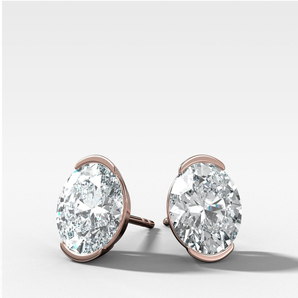 Oval Cut Half Bezel Diamond Studs
