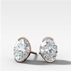 Oval Cut Half Bezel Diamond Studs