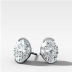 Oval Cut Half Bezel Diamond Studs