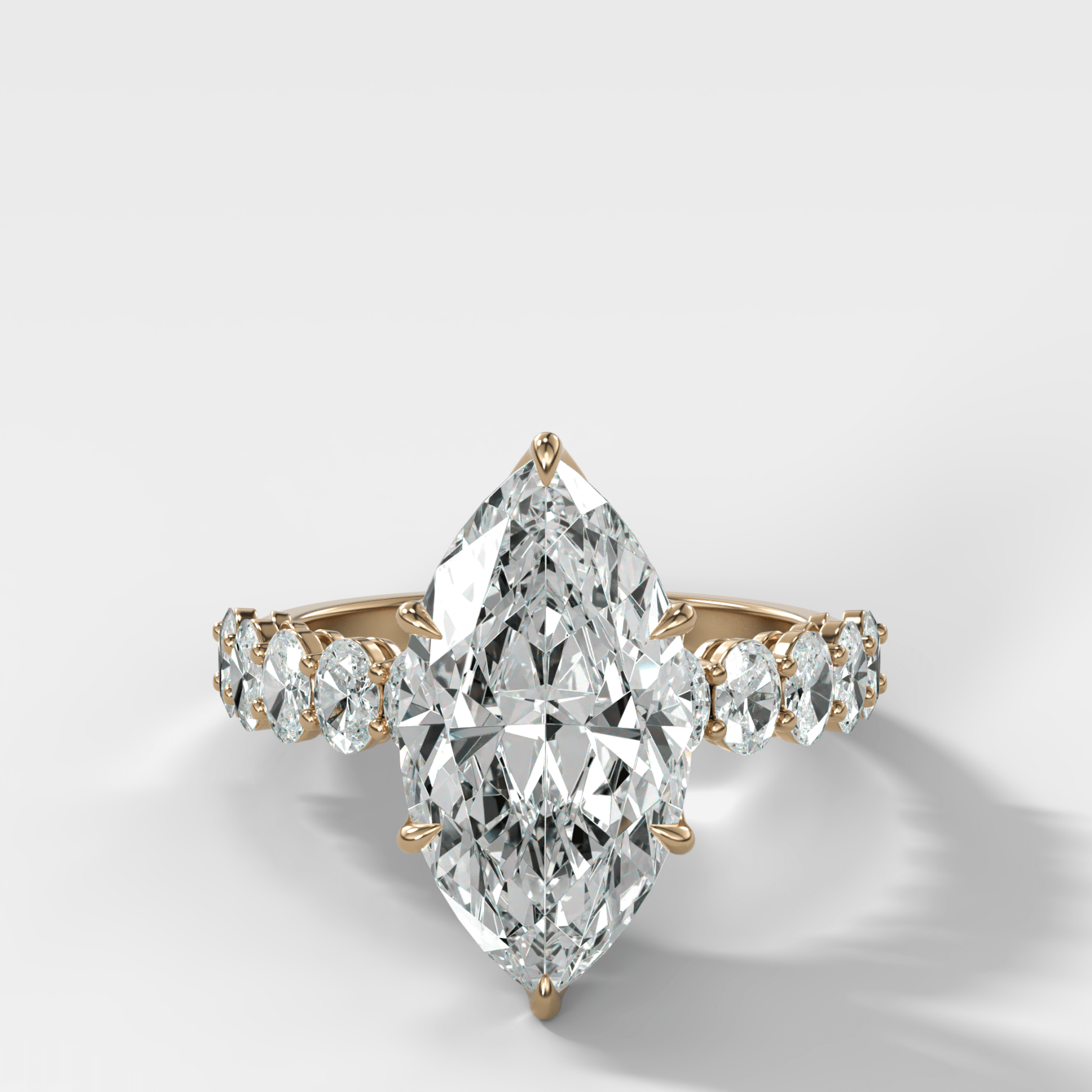 Oval Shared Prong Engagement Ring with Marquise Cut Diamond