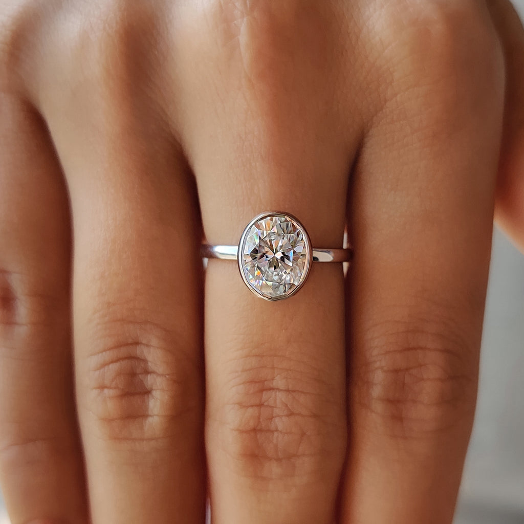 Oval Bezel Engagement Ring In Solitaire Style
