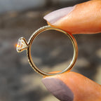 Pear Shaped Engagement Ring in Round Cut Pave Band