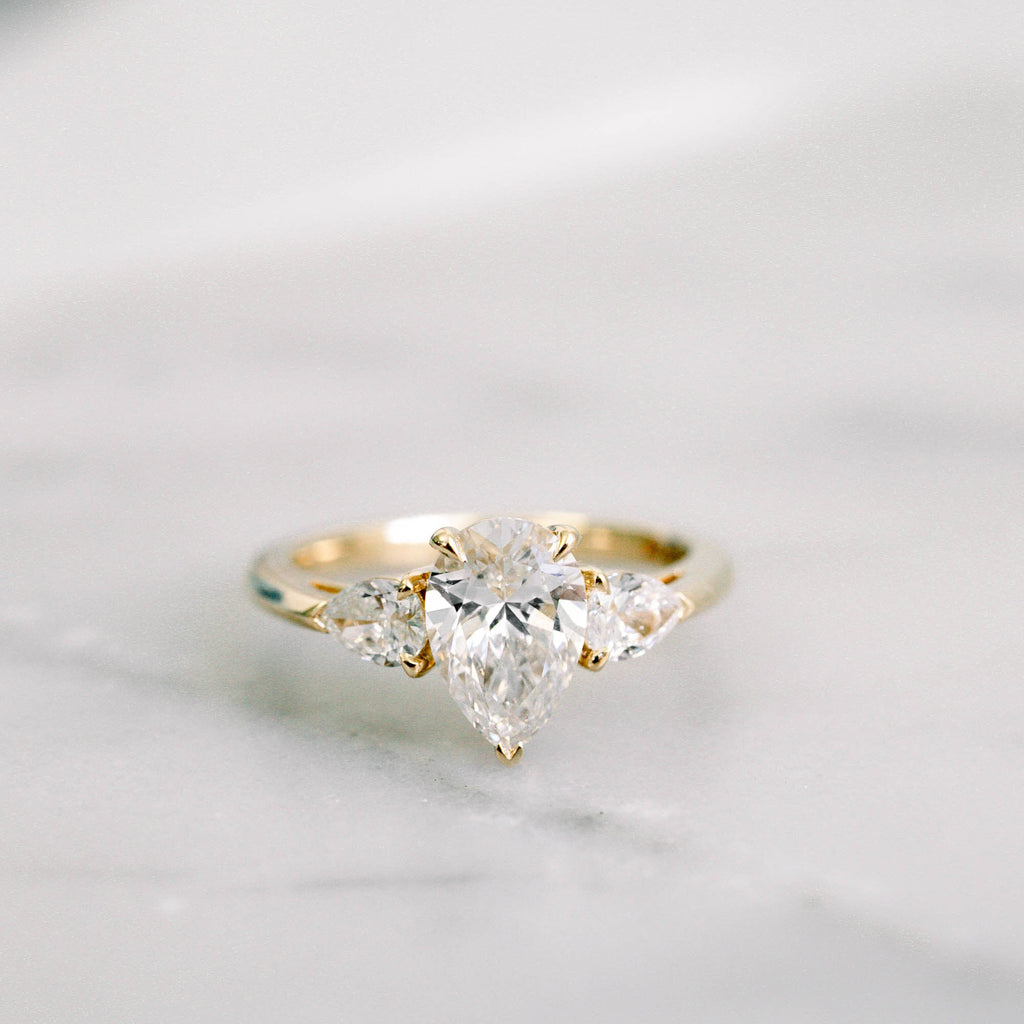 2.0 CT Pear Cut Moissanite Three Stone Engagement Ring