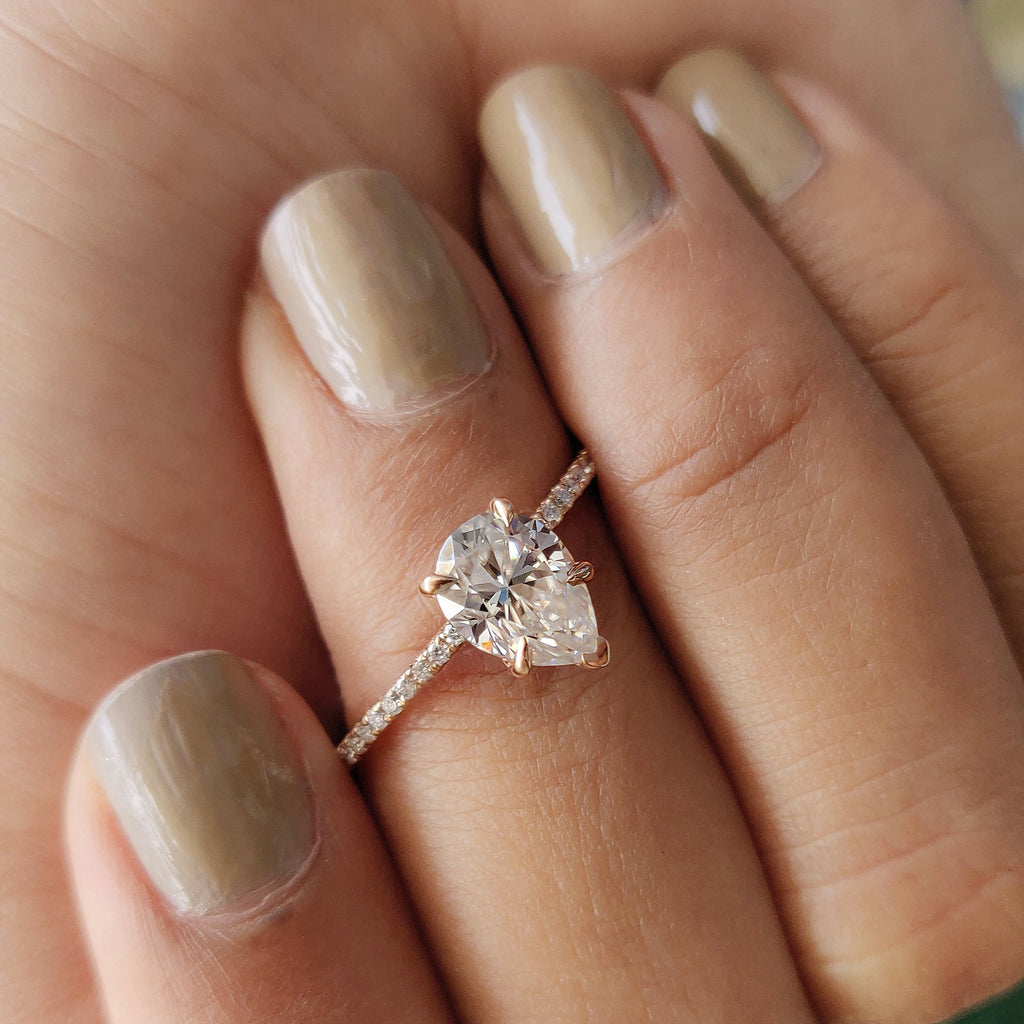 Pear Shaped Engagement Ring With Pave Setting