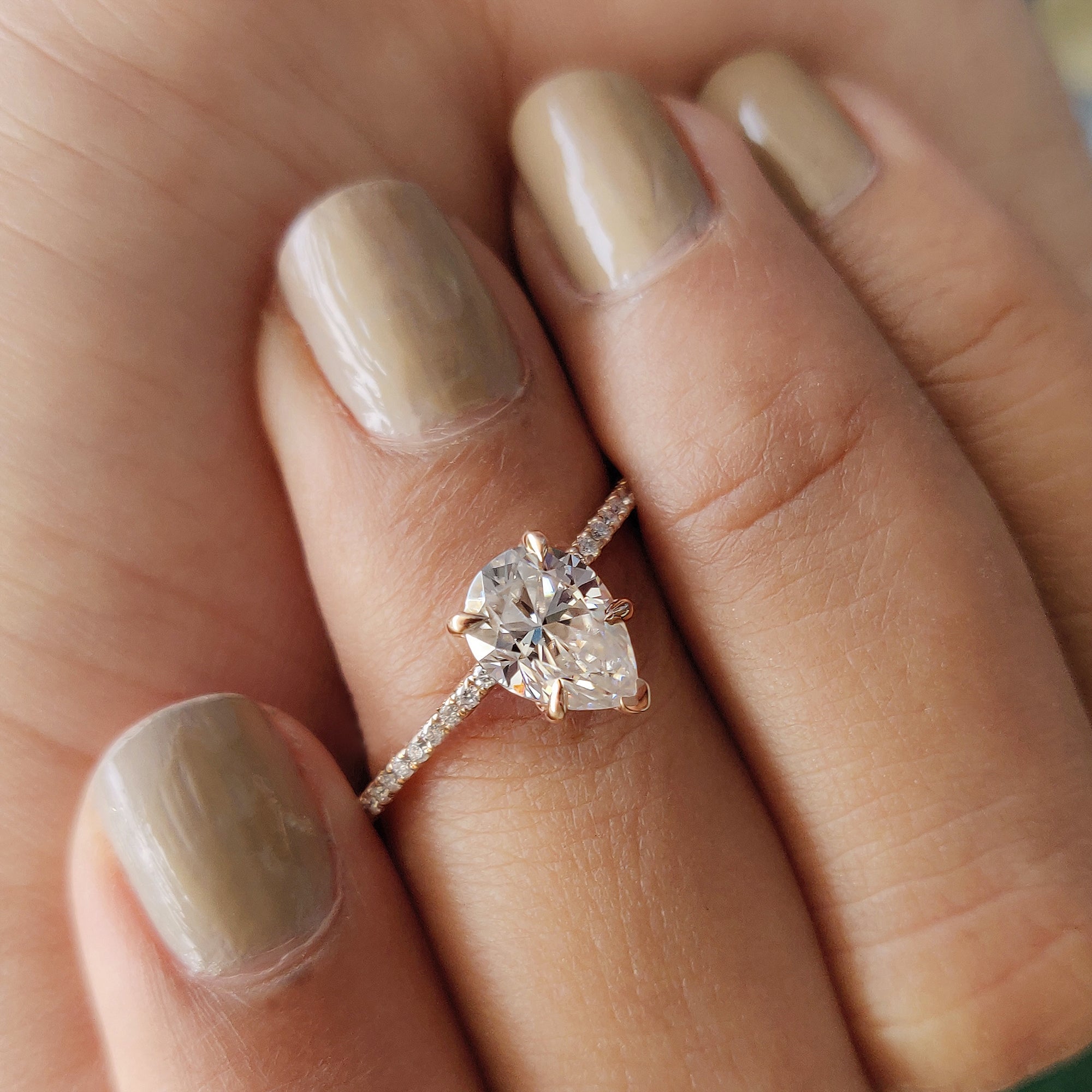 Pear Shaped Engagement Ring With Pave Setting