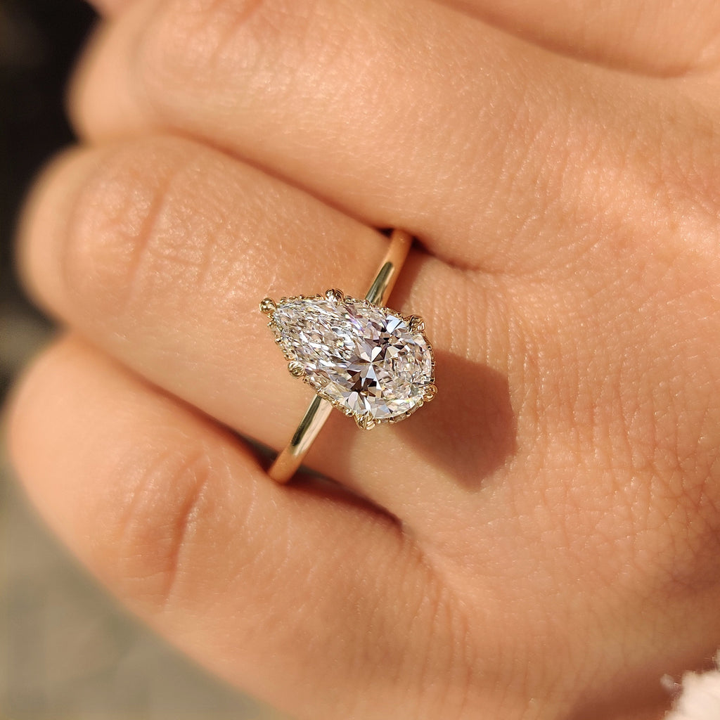 Solitaire Style Pear Diamond Engagement Ring
