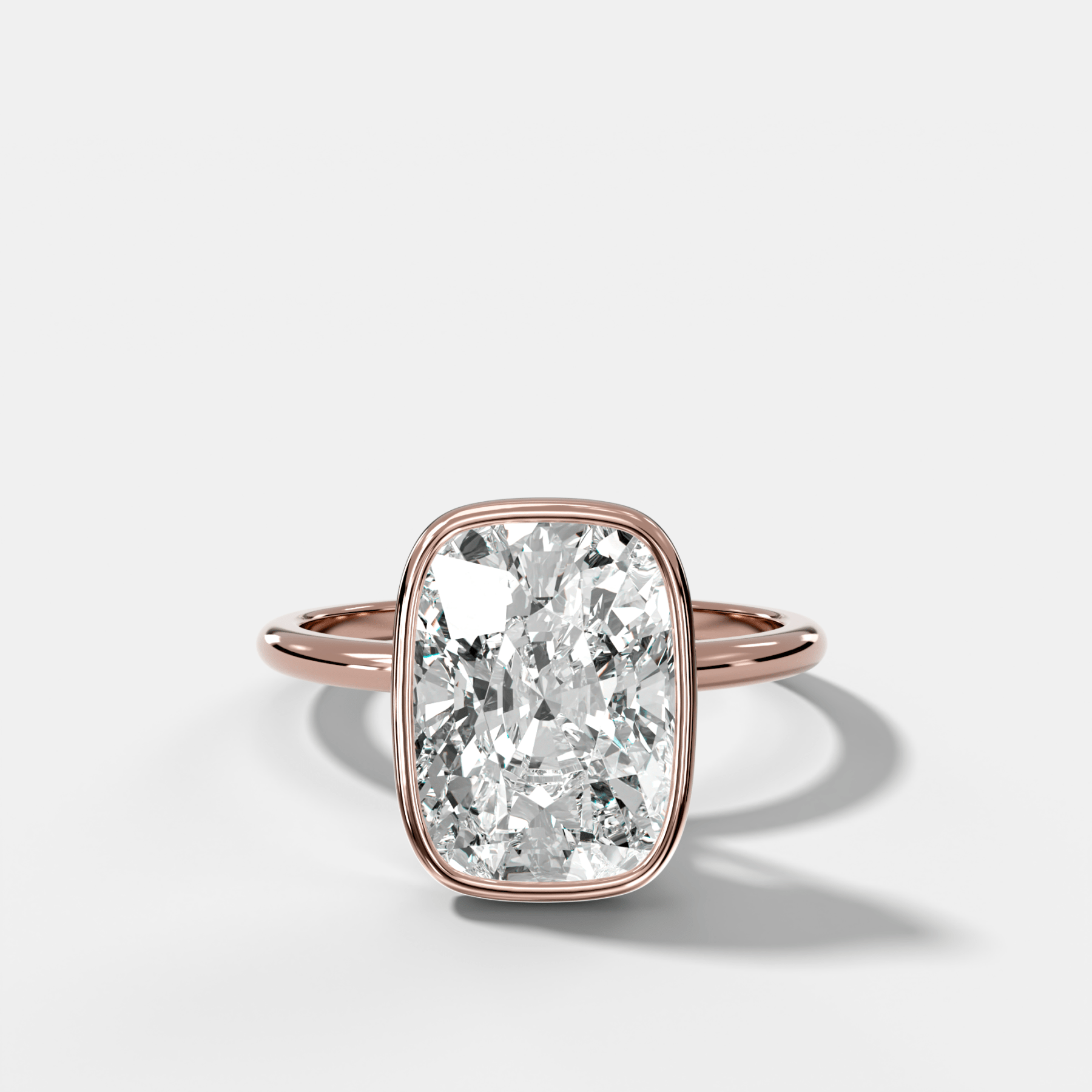 Penumbra Bezel Hidden Halo Engagement Ring with Elongated Cushion Cut
