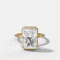 Penumbra Bezel Hidden Halo Engagement Ring with Elongated Radiant Cut