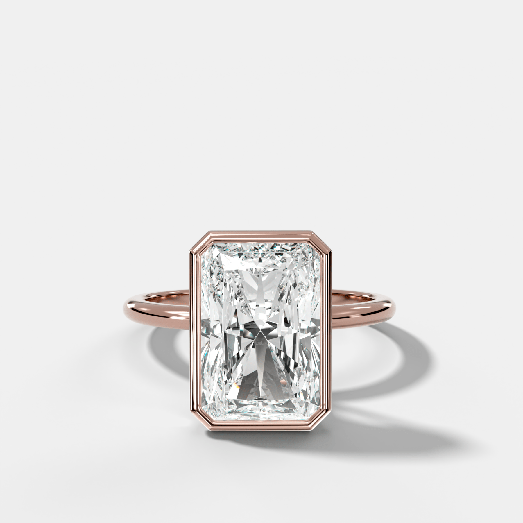Penumbra Bezel Hidden Halo Engagement Ring with Elongated Radiant Cut