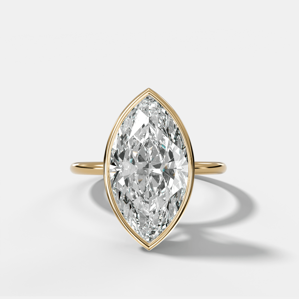 Penumbra Bezel Hidden Halo Engagement Ring with Marquise Cut