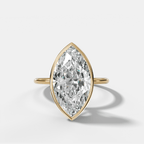 Penumbra Bezel Hidden Halo Engagement Ring with Marquise Cut