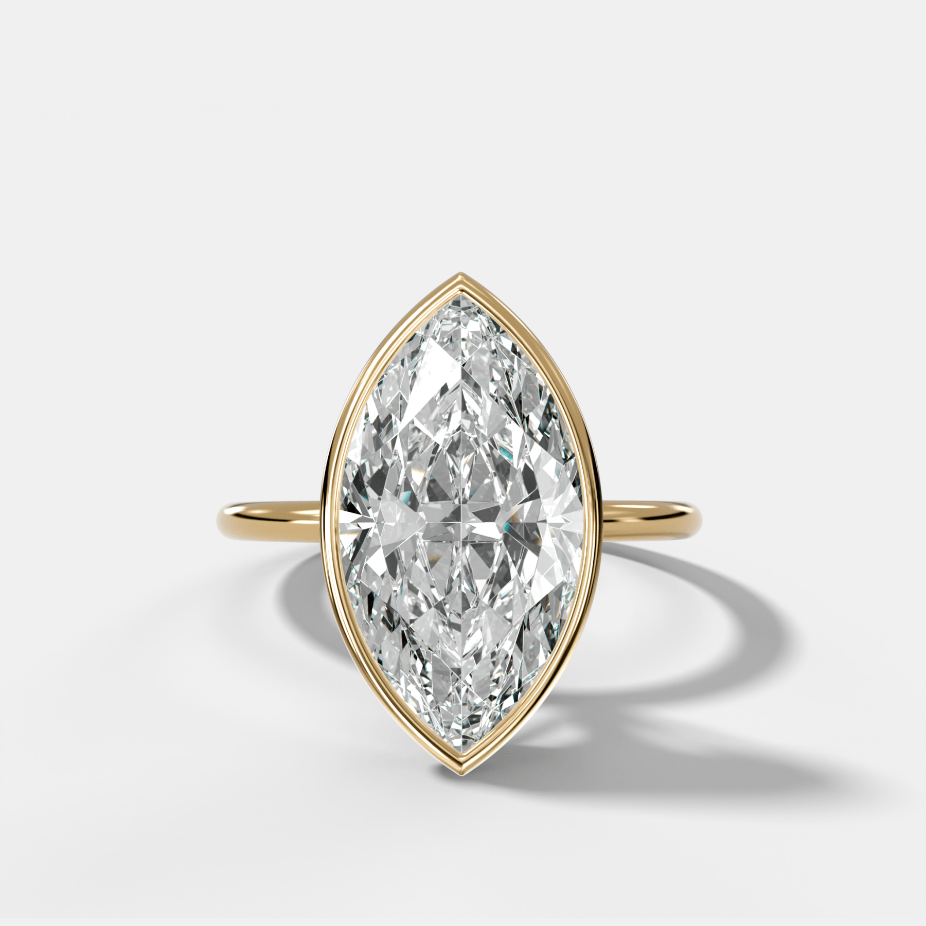 Penumbra Bezel Hidden Halo Engagement Ring with Marquise Cut
