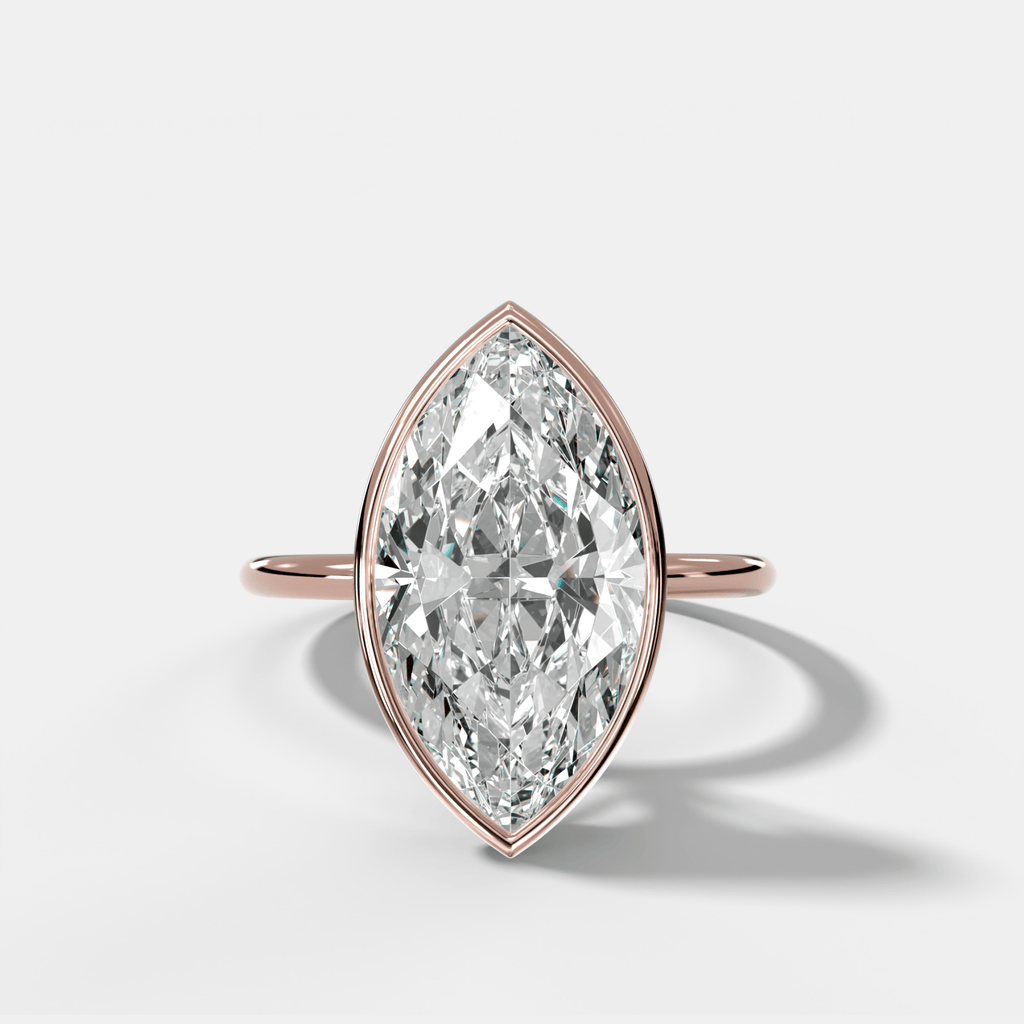 Penumbra Bezel Hidden Halo Engagement Ring with Marquise Cut