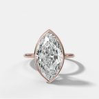 Penumbra Bezel Hidden Halo Engagement Ring with Marquise Cut