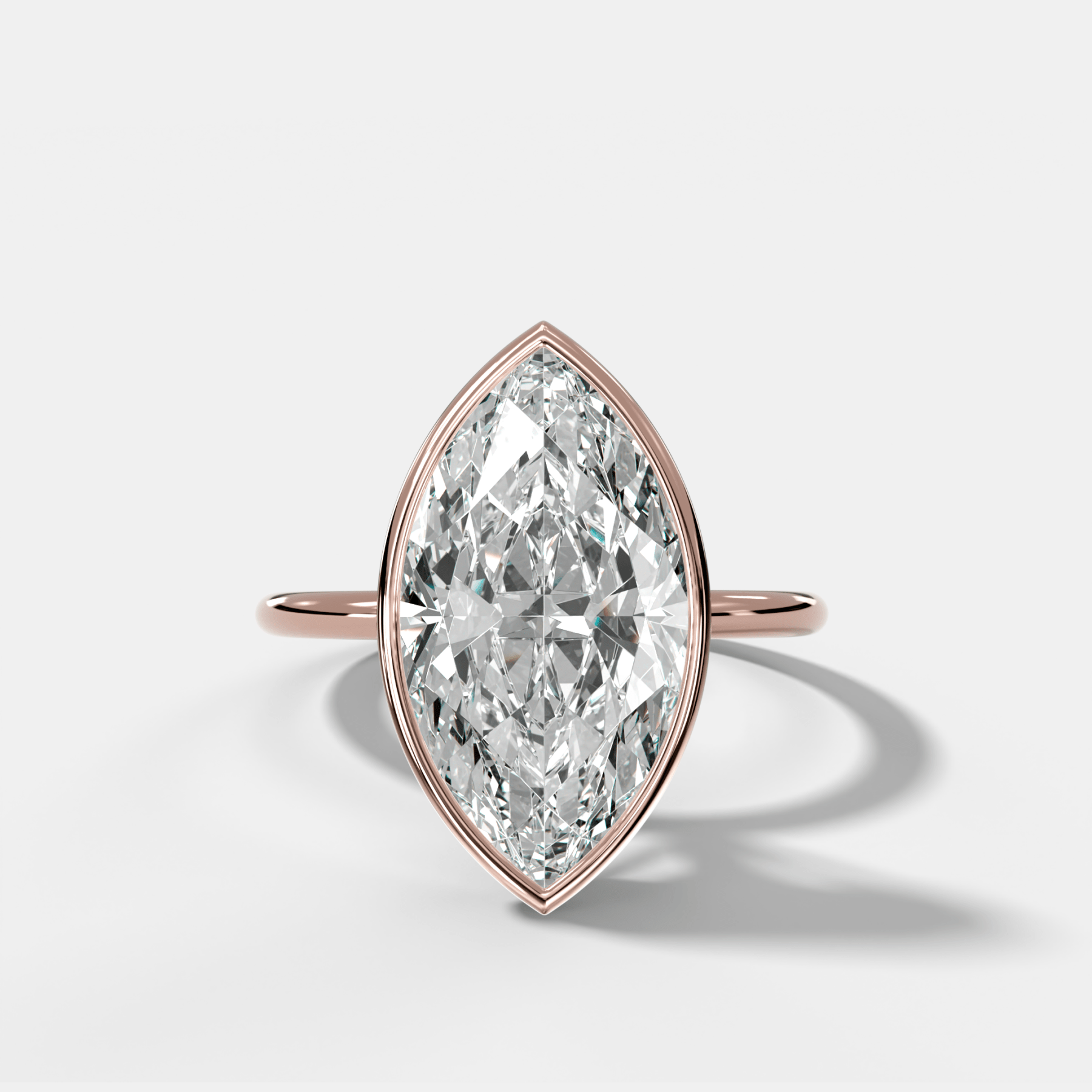 Penumbra Bezel Hidden Halo Engagement Ring with Marquise Cut
