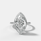 Penumbra Bezel Hidden Halo Engagement Ring with Marquise Cut