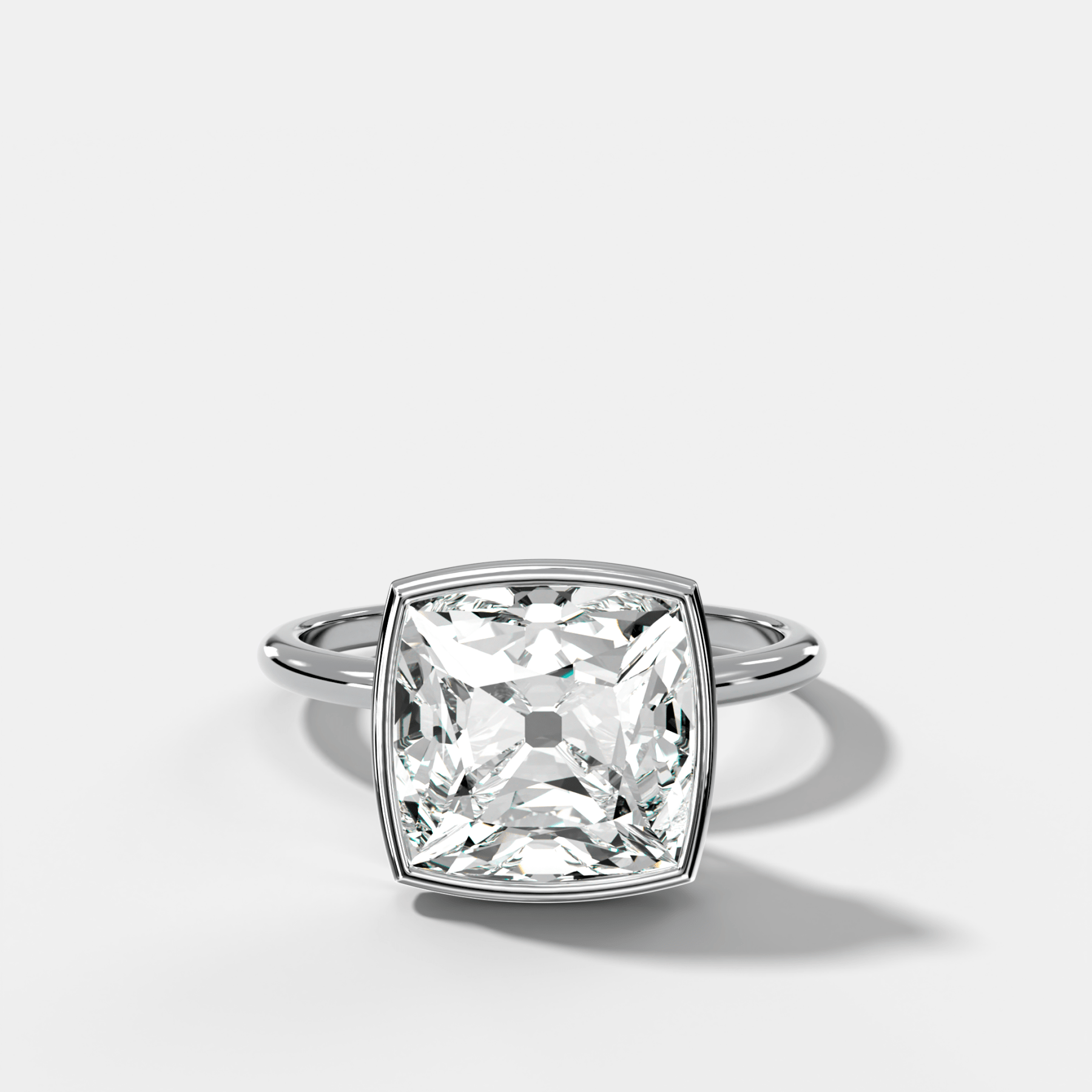 Penumbra Bezel Hidden Halo Engagement Ring with Old Mine Cut