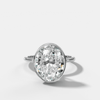 Penumbra Bezel Hidden Halo Engagement Ring with Oval Cut