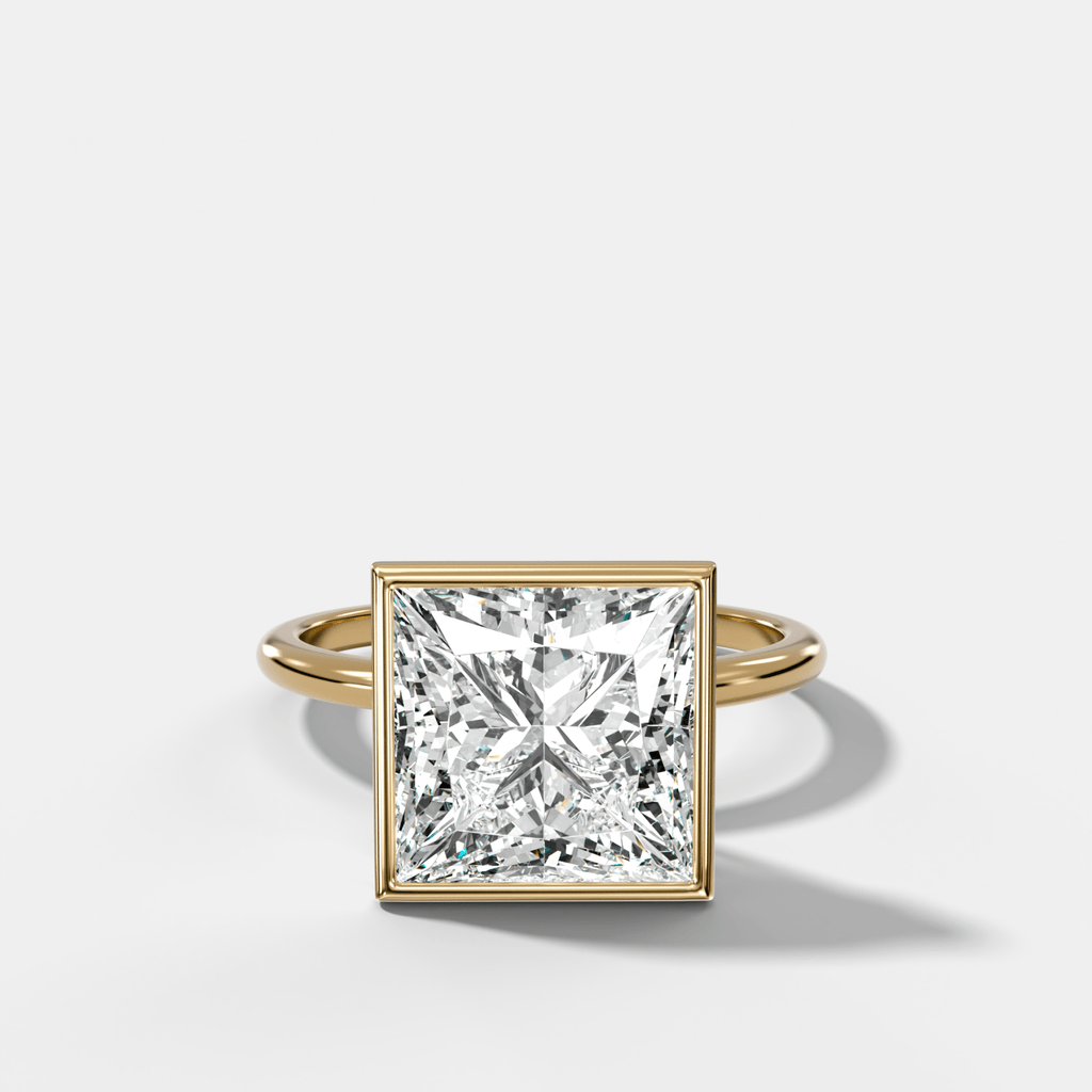Penumbra Bezel Hidden Halo Engagement Ring with Princess Cut