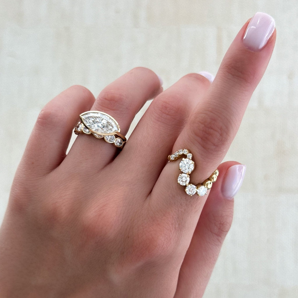 Penumbra Bezel Set Engagement Ring With East West Marquise Cut