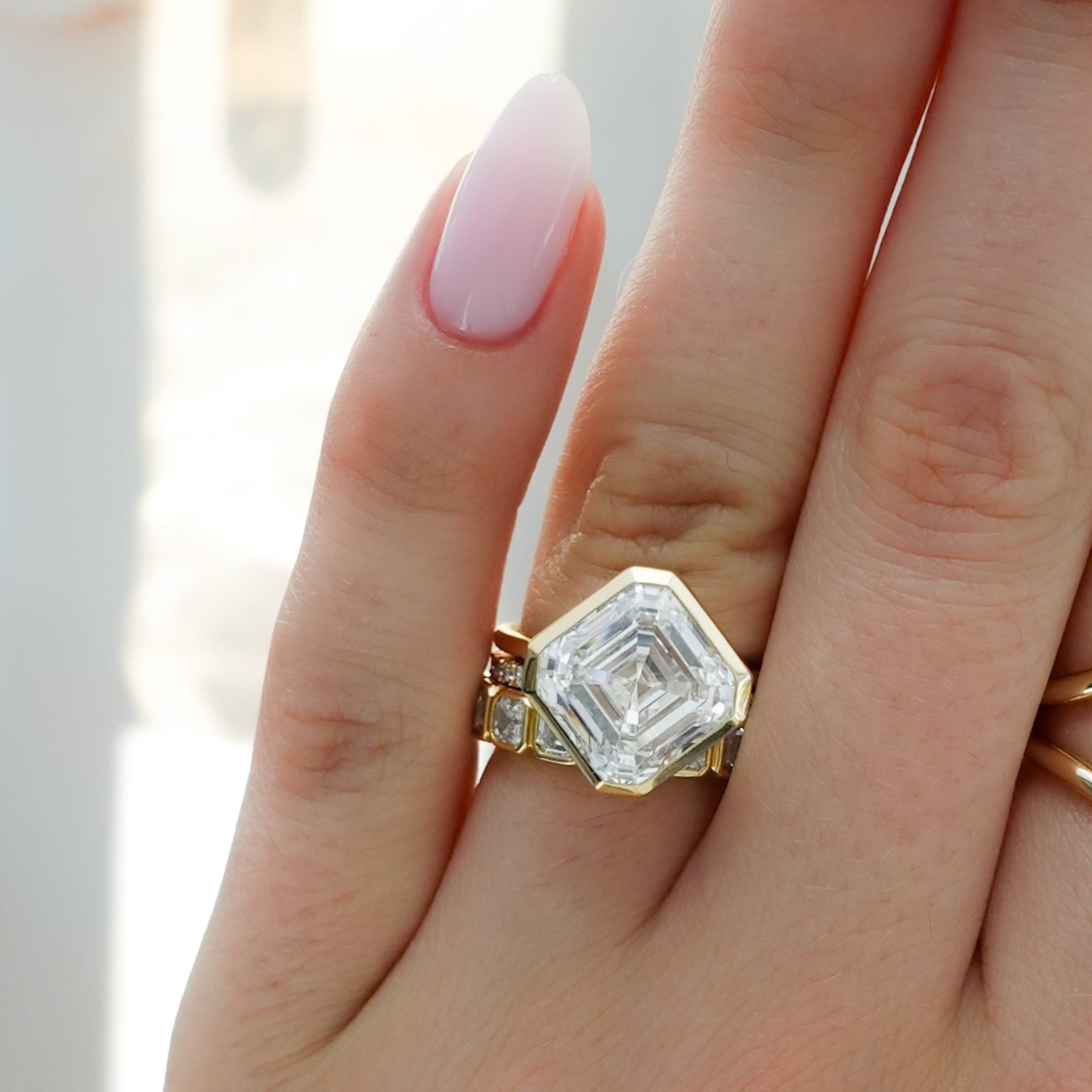Penumbra Bezel Set Engagement Ring With Tilted Asscher Cut