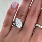 Penumbra Bezel Set Engagement Ring With Tilted Pear Cut