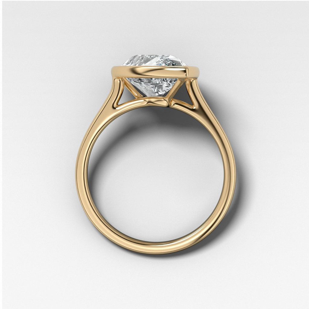 Penumbra Bezel Set Engagement Ring With Tilted Pear Cut