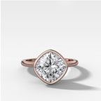 Penumbra Bezel Set Engagement Ring With Tilted Square Cushion Cut