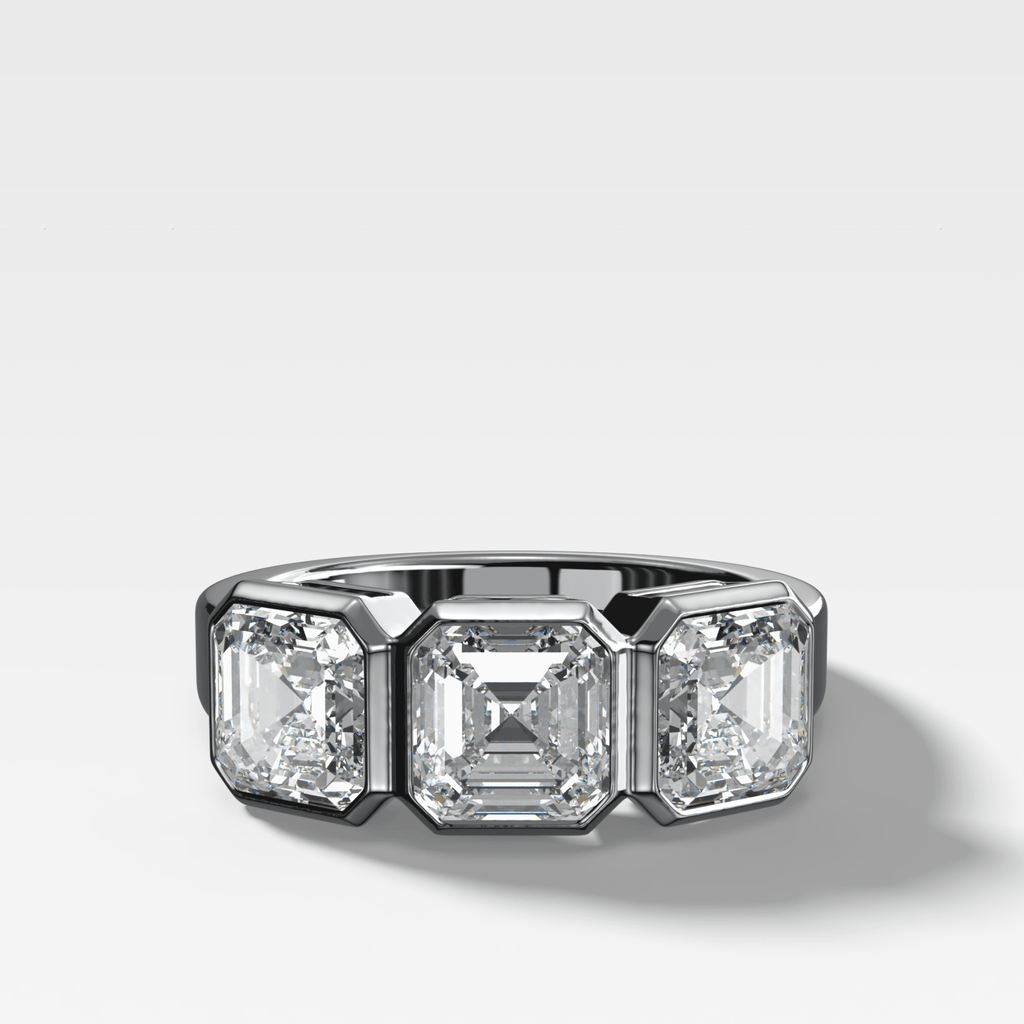 Penumbra Bezel Triad Engagement Ring With Asscher Cut Diamonds