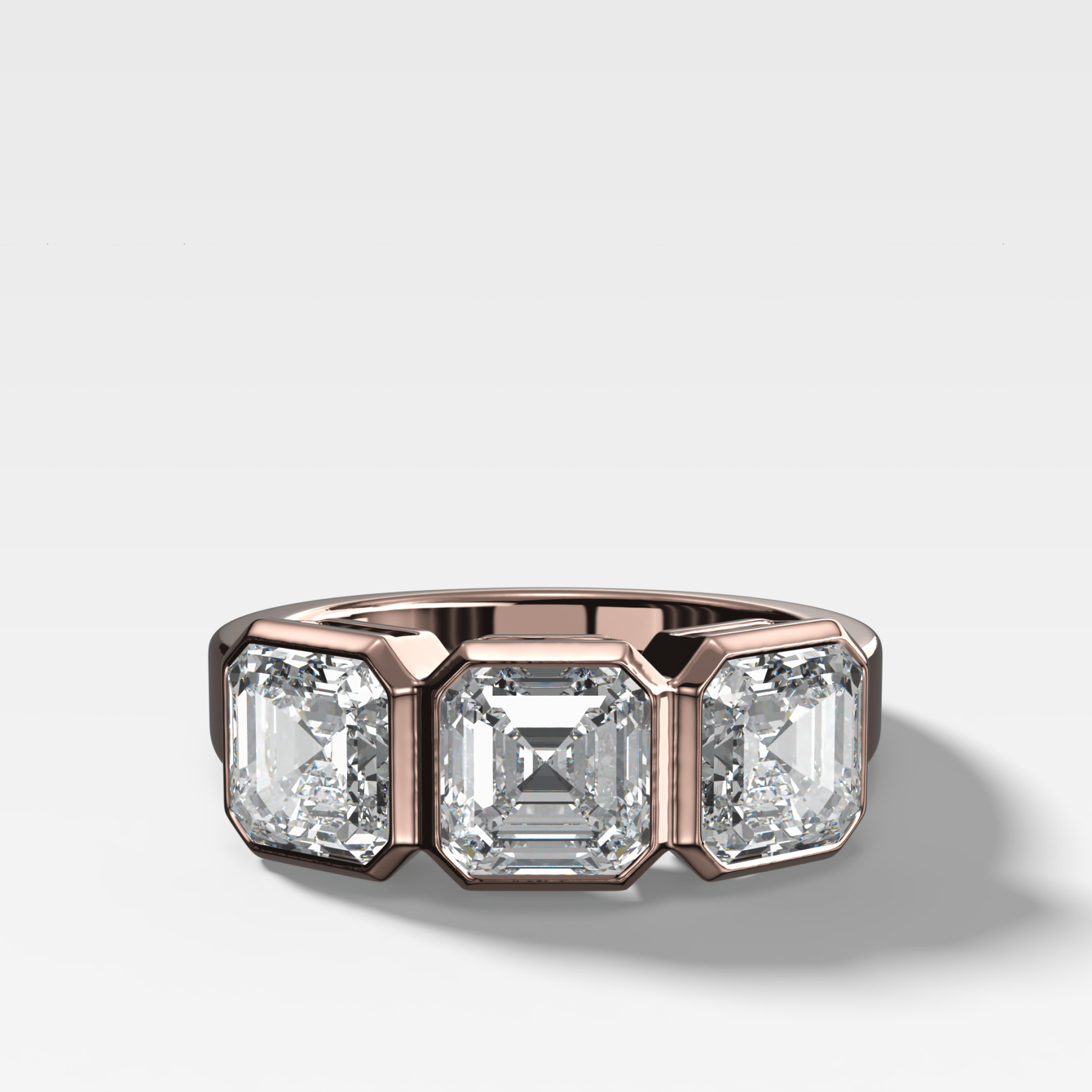 Penumbra Bezel Triad Engagement Ring With Asscher Cut Diamonds