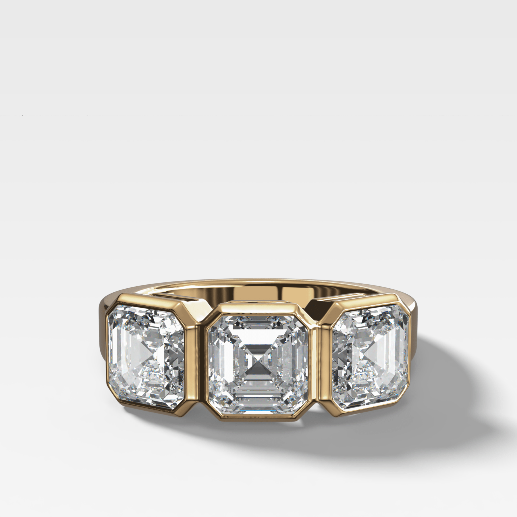 Penumbra Bezel Triad Engagement Ring With Asscher Cut Diamonds