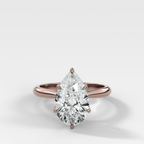 Tulip Basket Cathedral Engagement Ring with Pear Cut Diamond