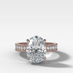Petite Channel Set Engagement Ring with Oval Cut Diamond
