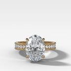 Petite Channel Set Engagement Ring with Oval Cut Diamond