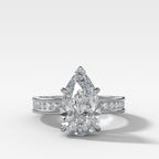 Petite Channel Set Engagement Ring with Pear Cut Diamond