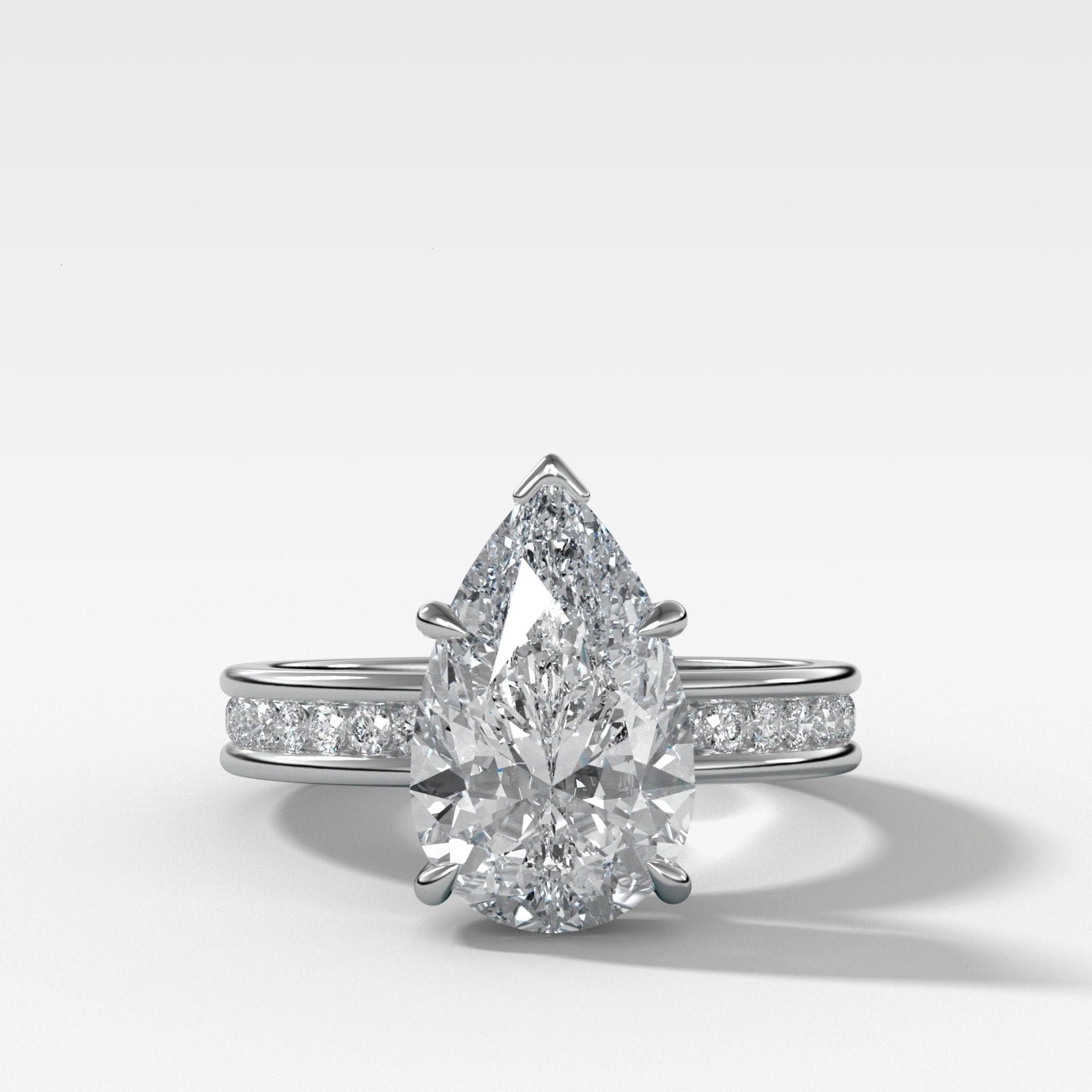 Petite Channel Set Engagement Ring with Pear Cut Diamond