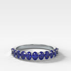 Petite Shared Prong Wedding Band with Blue Sapphire Oval Gemstones