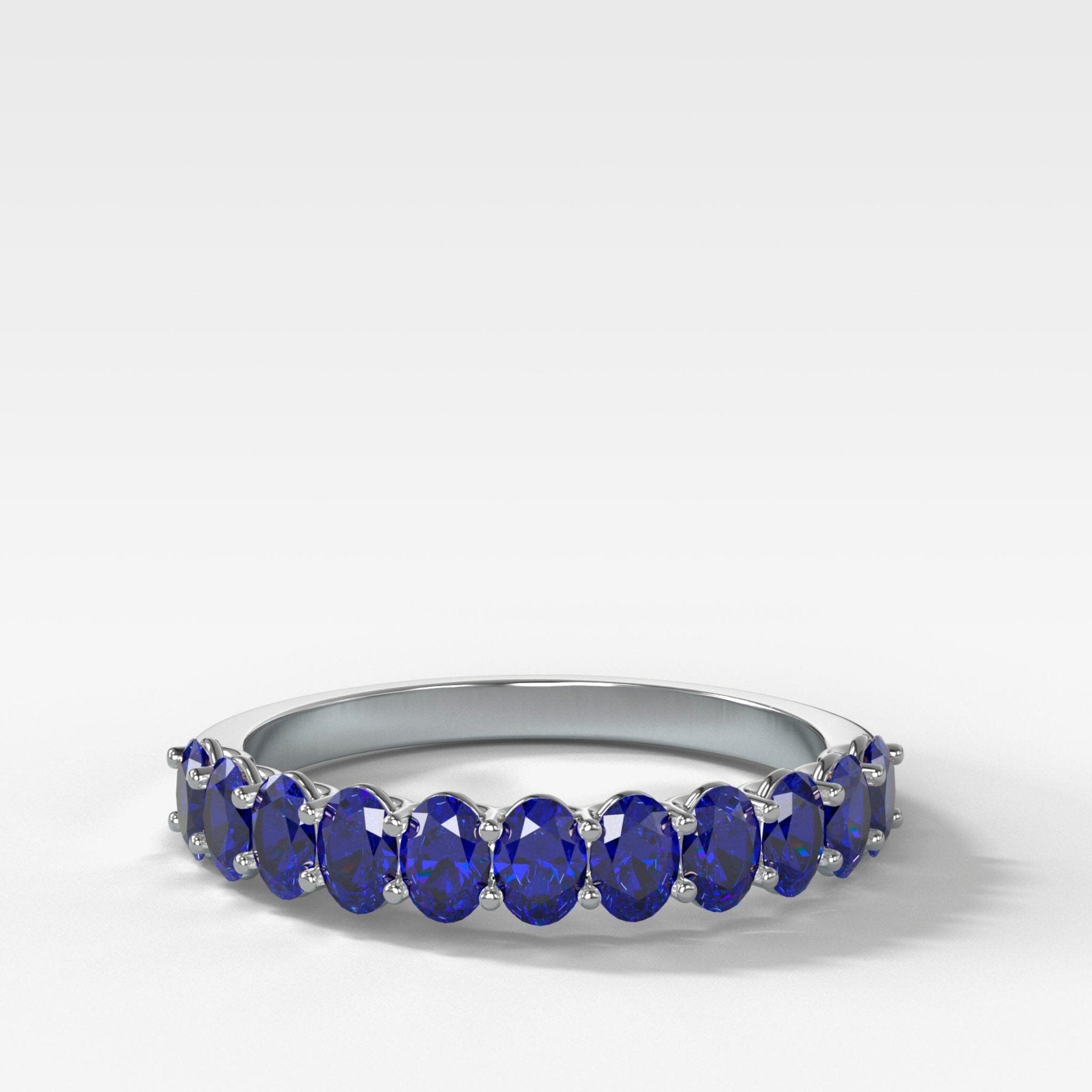 Petite Shared Prong Wedding Band with Blue Sapphire Oval Gemstones