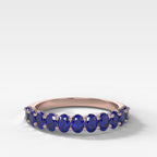 Petite Shared Prong Wedding Band with Blue Sapphire Oval Gemstones