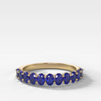 Petite Shared Prong Wedding Band with Blue Sapphire Oval Gemstones